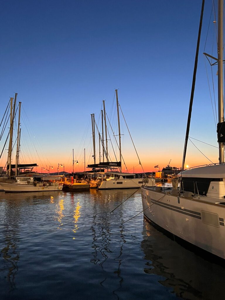 Naxos town port yachts sunset